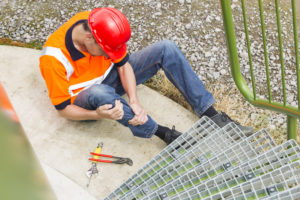 Personal Injury Lawyer Las Vegas, NV with a construction work holding leg next to stairs