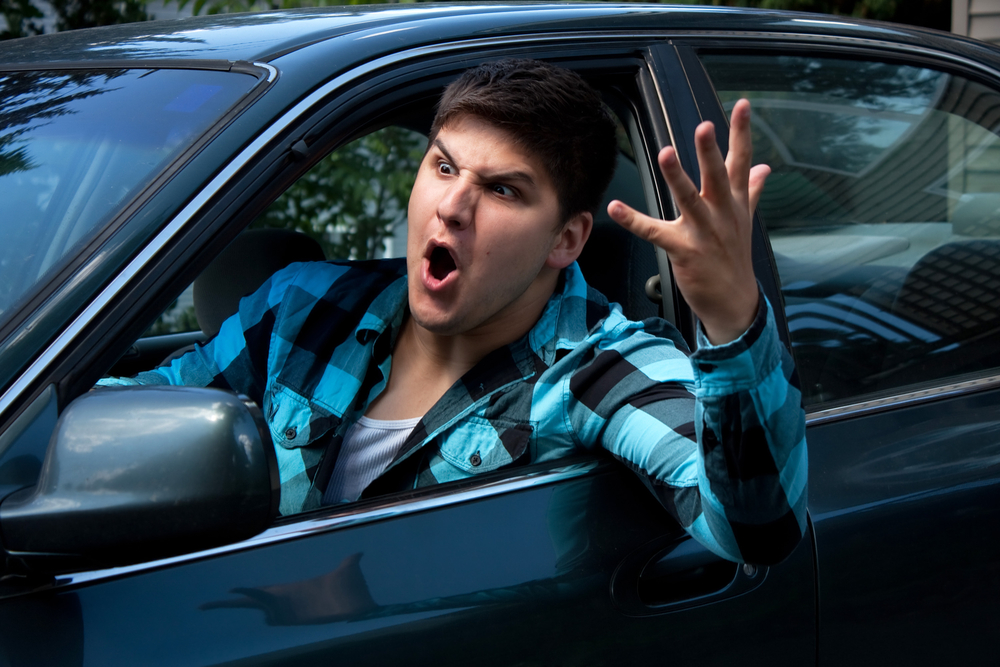 The Serious Threat Of Aggressive Driving - Man Expressing Road Rage